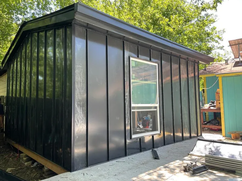 Black standing seam metal wall panels for Metal Roof Installation in Holly Hill