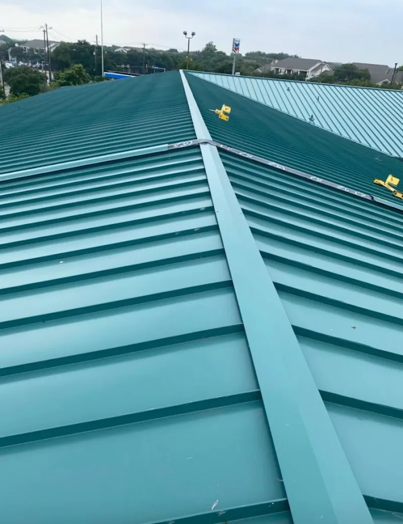 Green commercial metal roof ridge and valley for Metal Roof Repair in Holly Hill